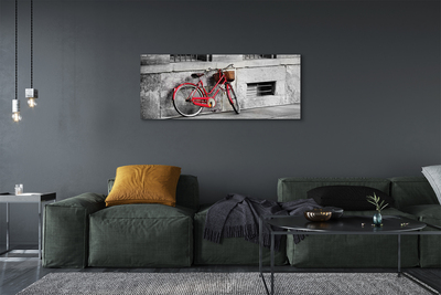 Leinwandbilder rotes Fahrrad mit einem Korb