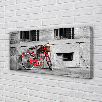 Leinwandbilder rotes Fahrrad mit einem Korb