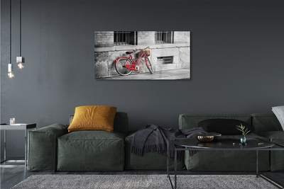 Glasbilder Rotes fahrrad mit einem korb